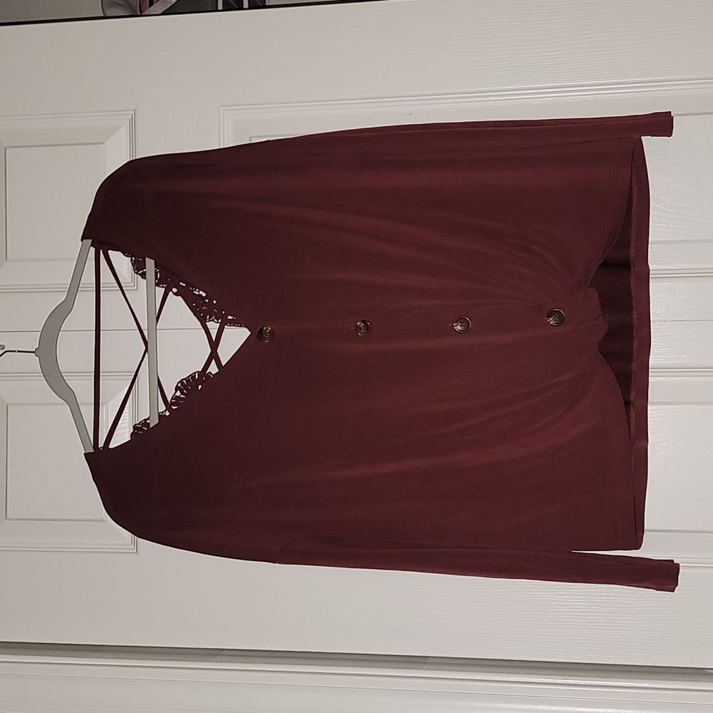 Long sleeve t shirt, open back, low cut front  color is burgundy